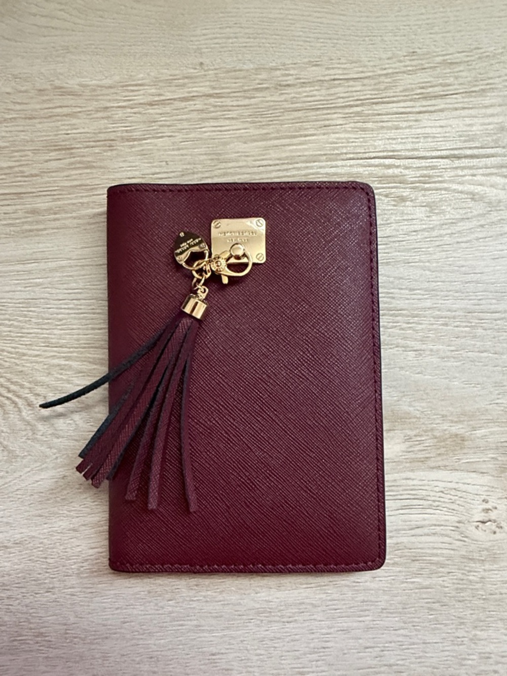 henri bendel Burgundy Leather Tassel Passport/Card Holder with Gold Hardware